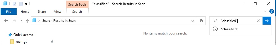 a Windows File Folder, zoomed in at the top part of the window featuring the search bar in the top right corner with the word 'classified' typed in the search bar. The search results feature text saying 'No items match your search'