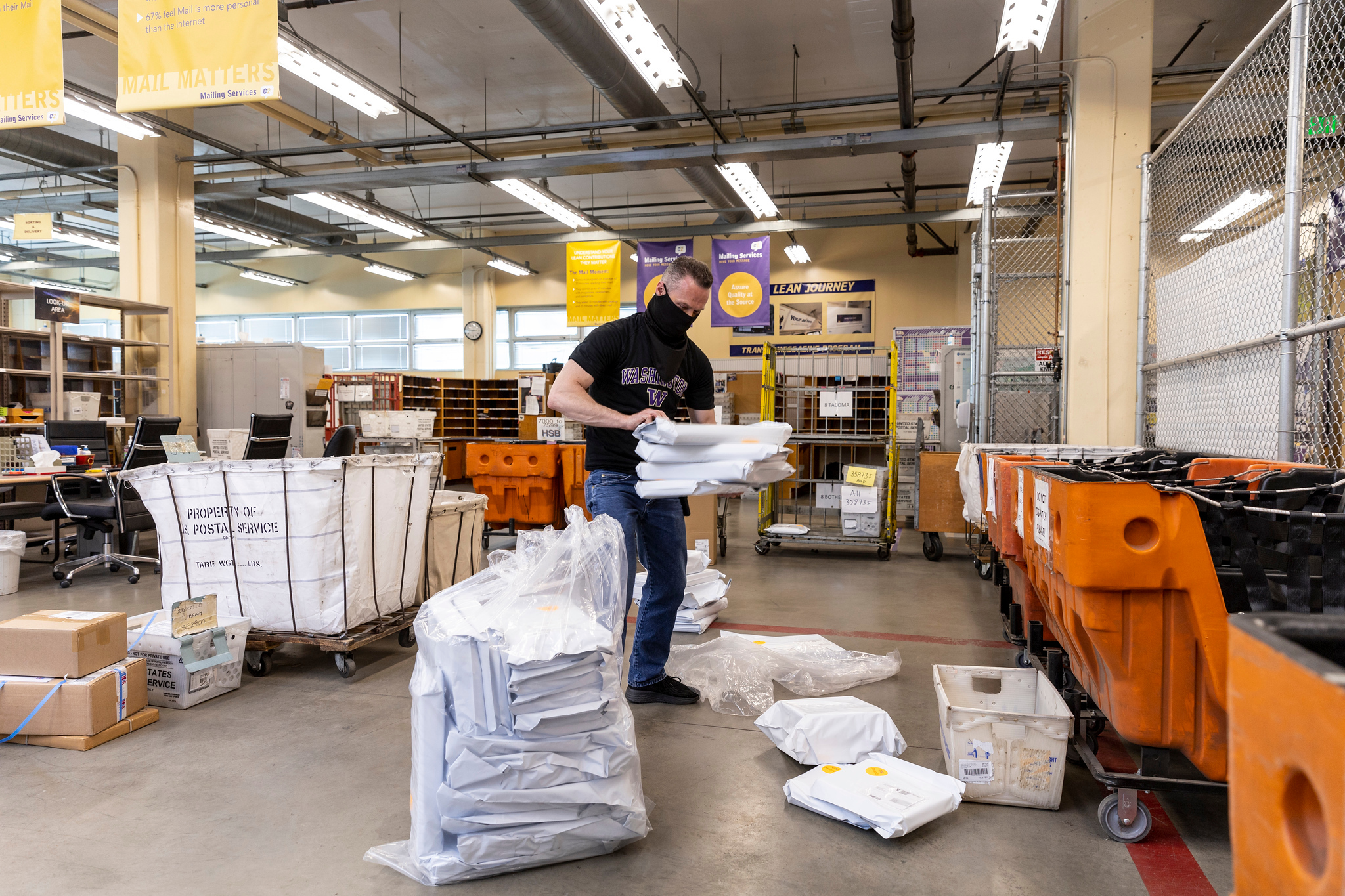 man sorting received items