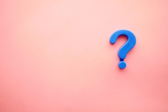 blue 3D question mark on peach background