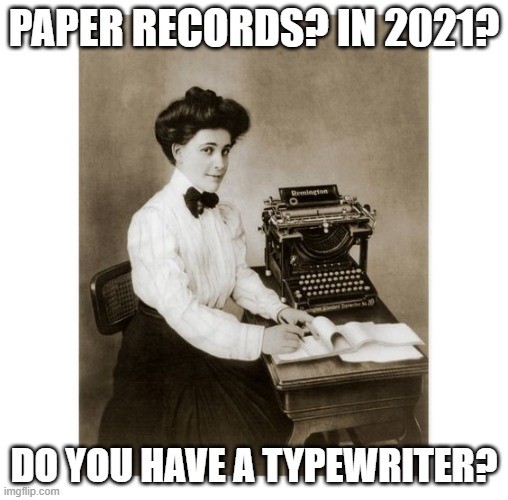 1910s woman at typewriter PAPER RECORDS? IN 2021? DO YOU HAVE A TYPEWRITER?