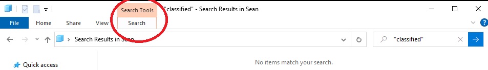 a Windows File Folder, zoomed in at the top part of the window featuring the search bar in the top right corner with the word 'classified' typed in the search bar with the 'Search Tools - Search' toolbar at the top of the page circled